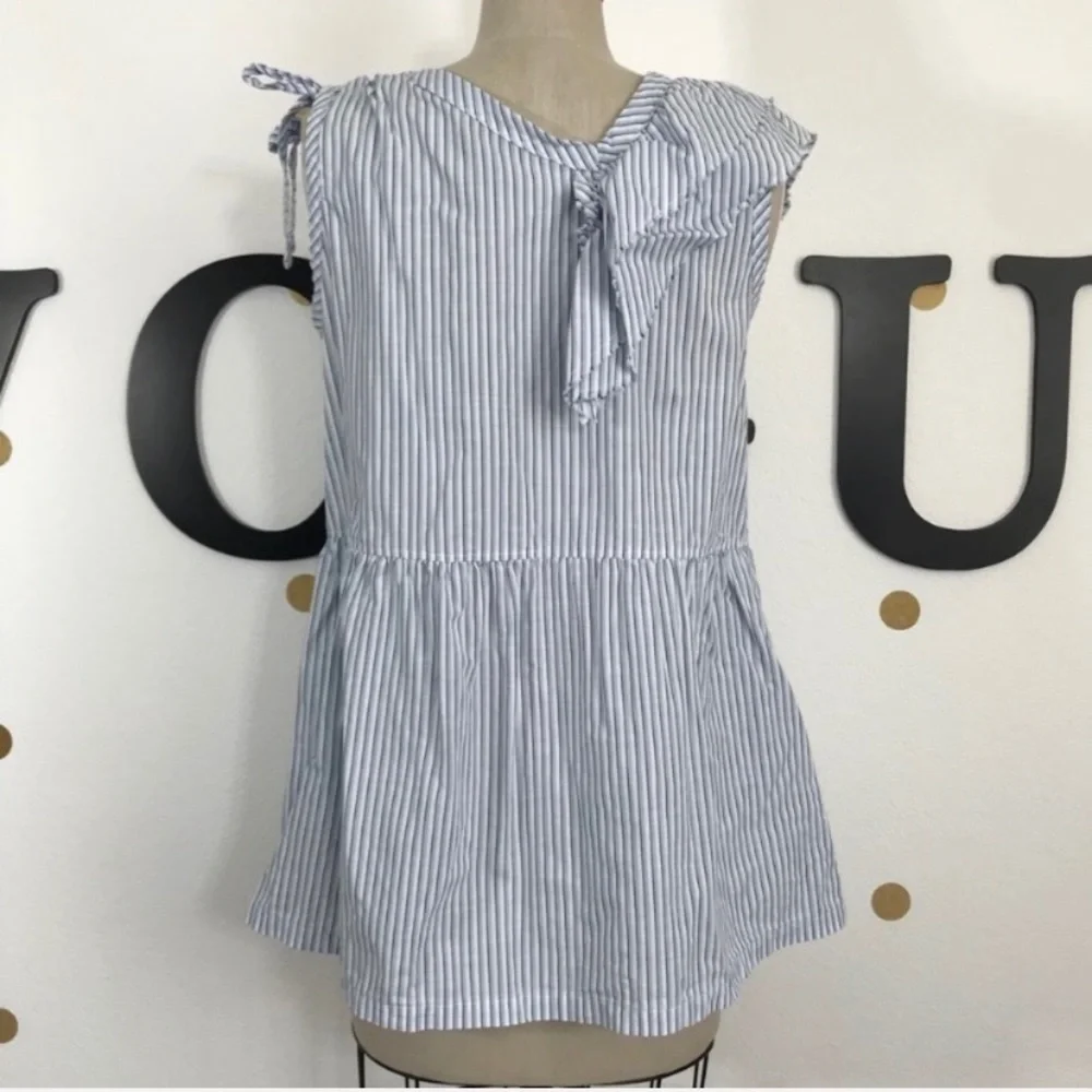 Left of Center M top size M